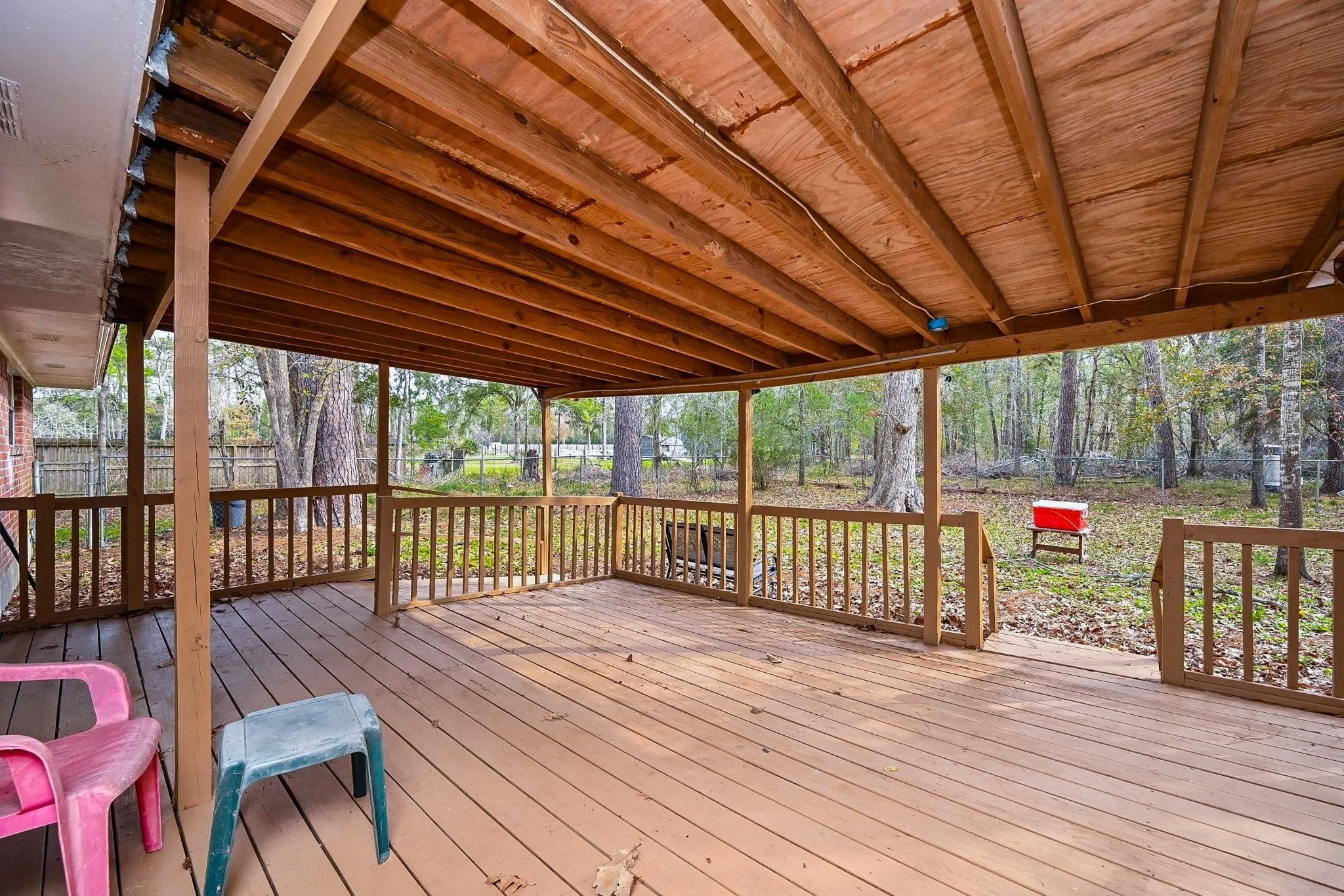 17831 Magnolia Lane New Caney, TX 77357 - Photo 18 of 27 Step out onto this expansive covered patio! This patio leads to a huge and private backyard oasis!
