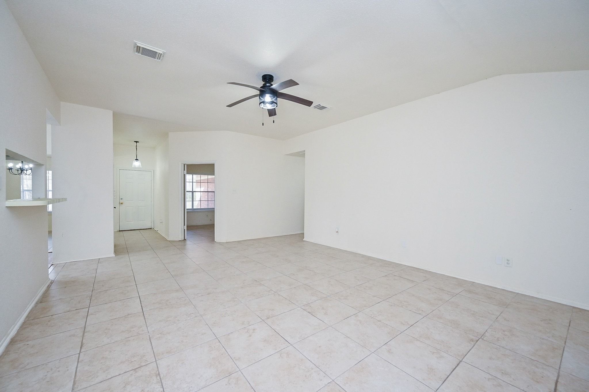 17831 Magnolia Lane New Caney, TX 77357 - Photo 9 of 27 The neutral-toned walls give the perfect opportunity to really decorate and make this home yours! The ceiling fan ensures comfortable temperatures year-round!