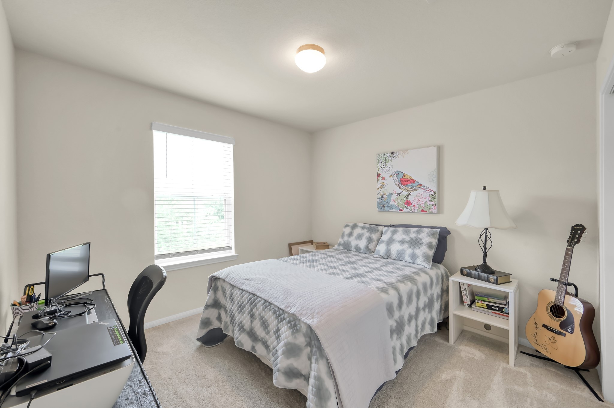 21550 Rainfall Park Drive Spring, TX 77388 - Photo 24 of 38 a bedroom with a bed and a chair in it