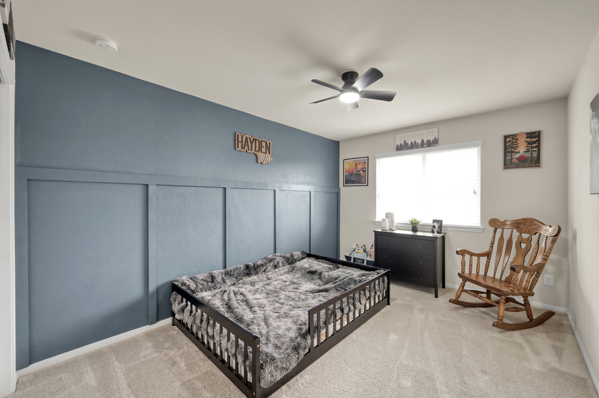 21550 Rainfall Park Drive Spring, TX 77388 - Photo 27 of 38 a bedroom with a bed and chair