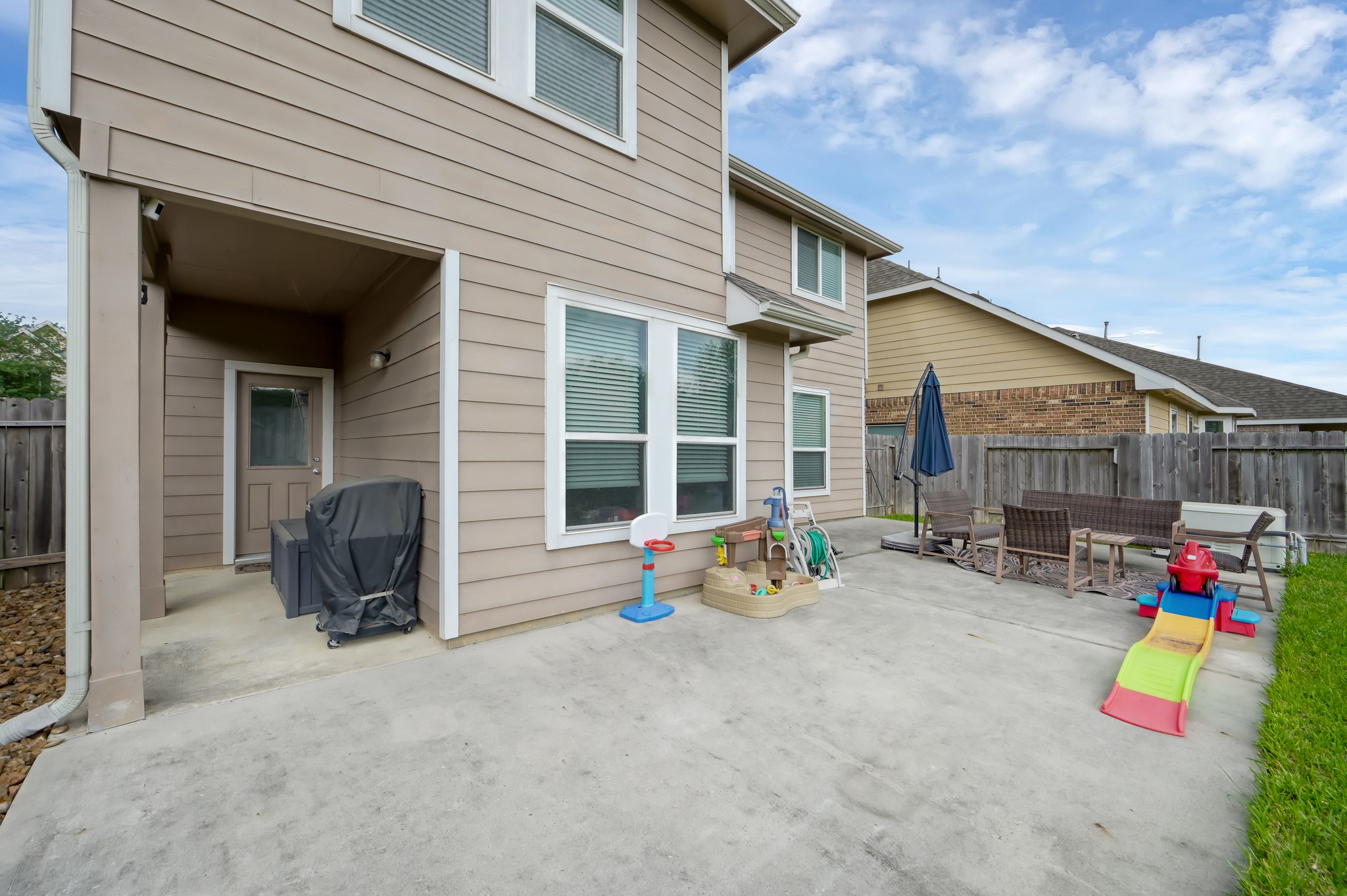 21550 Rainfall Park Drive Spring, TX 77388 - Photo 32 of 38 a view of outdoor space with porch and furniture
