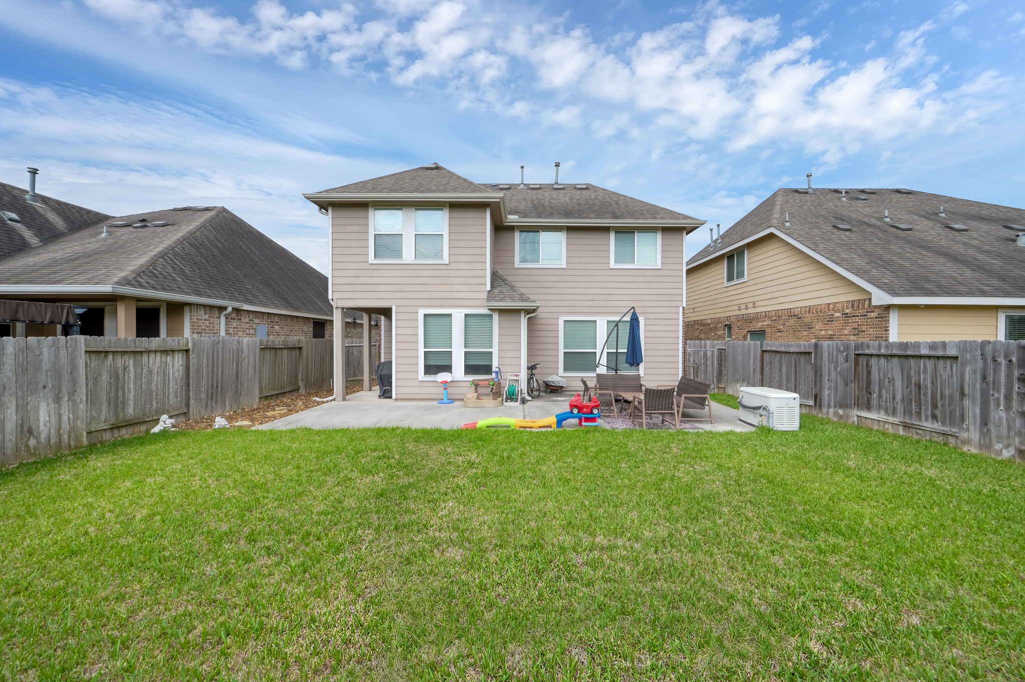 21550 Rainfall Park Drive Spring, TX 77388 - Photo 35 of 38 a view of a house with a yard and sitting area