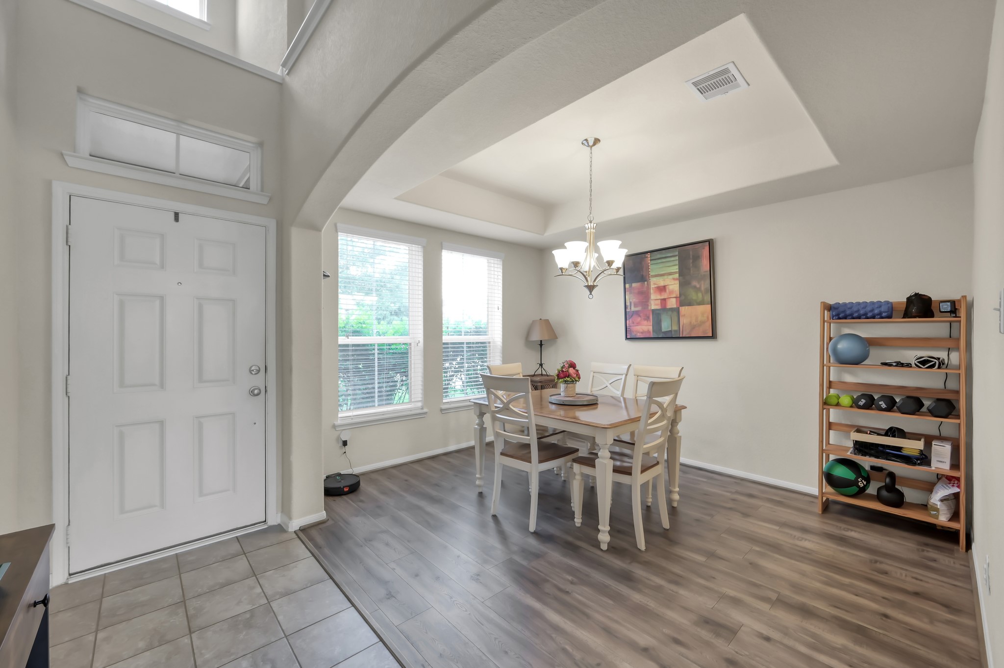 21550 Rainfall Park Drive Spring, TX 77388 - Photo 4 of 38 a view of a dining room with furniture and wooden floor