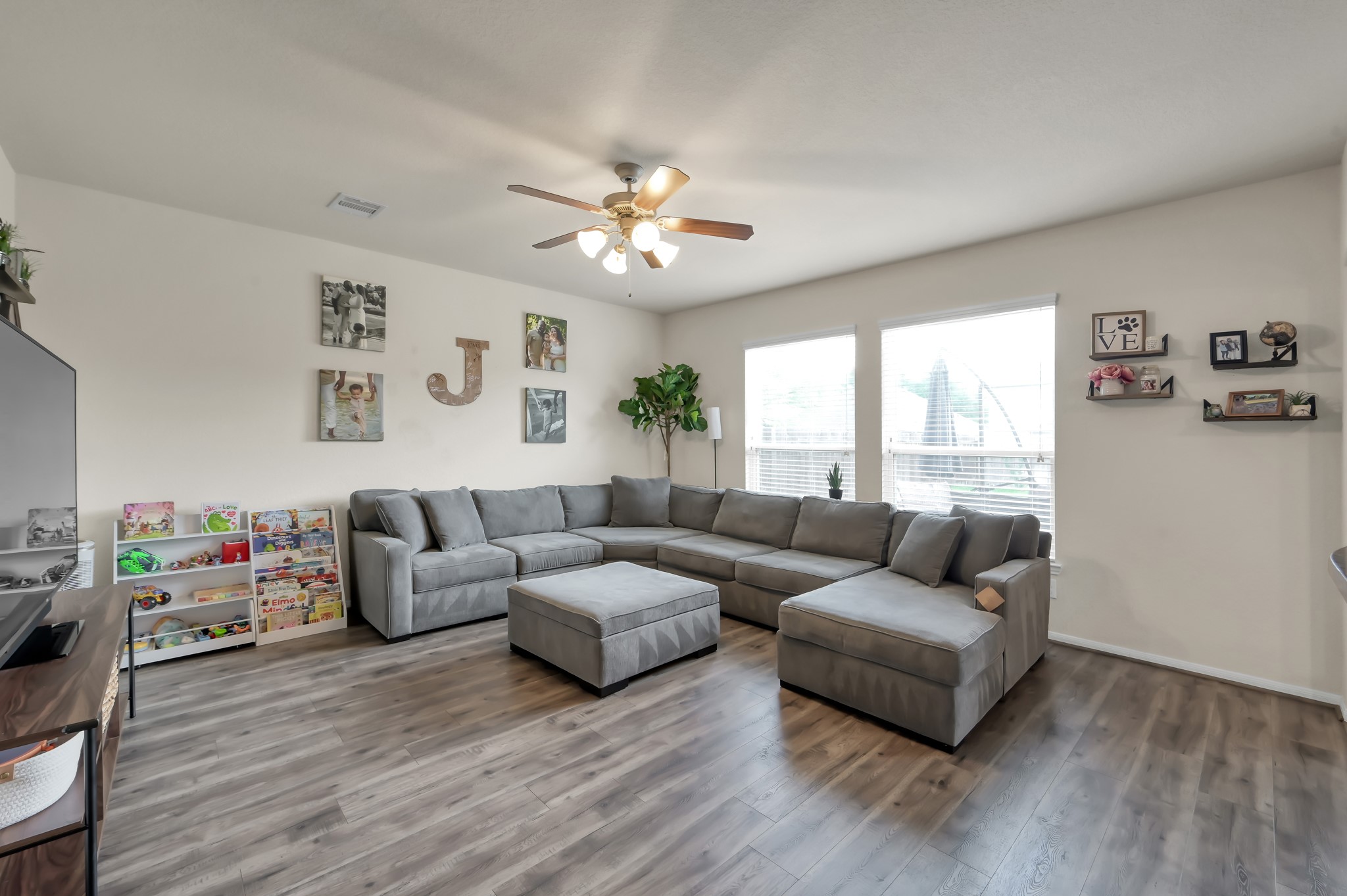 21550 Rainfall Park Drive Spring, TX 77388 - Photo 6 of 38 a living room with furniture and a large window