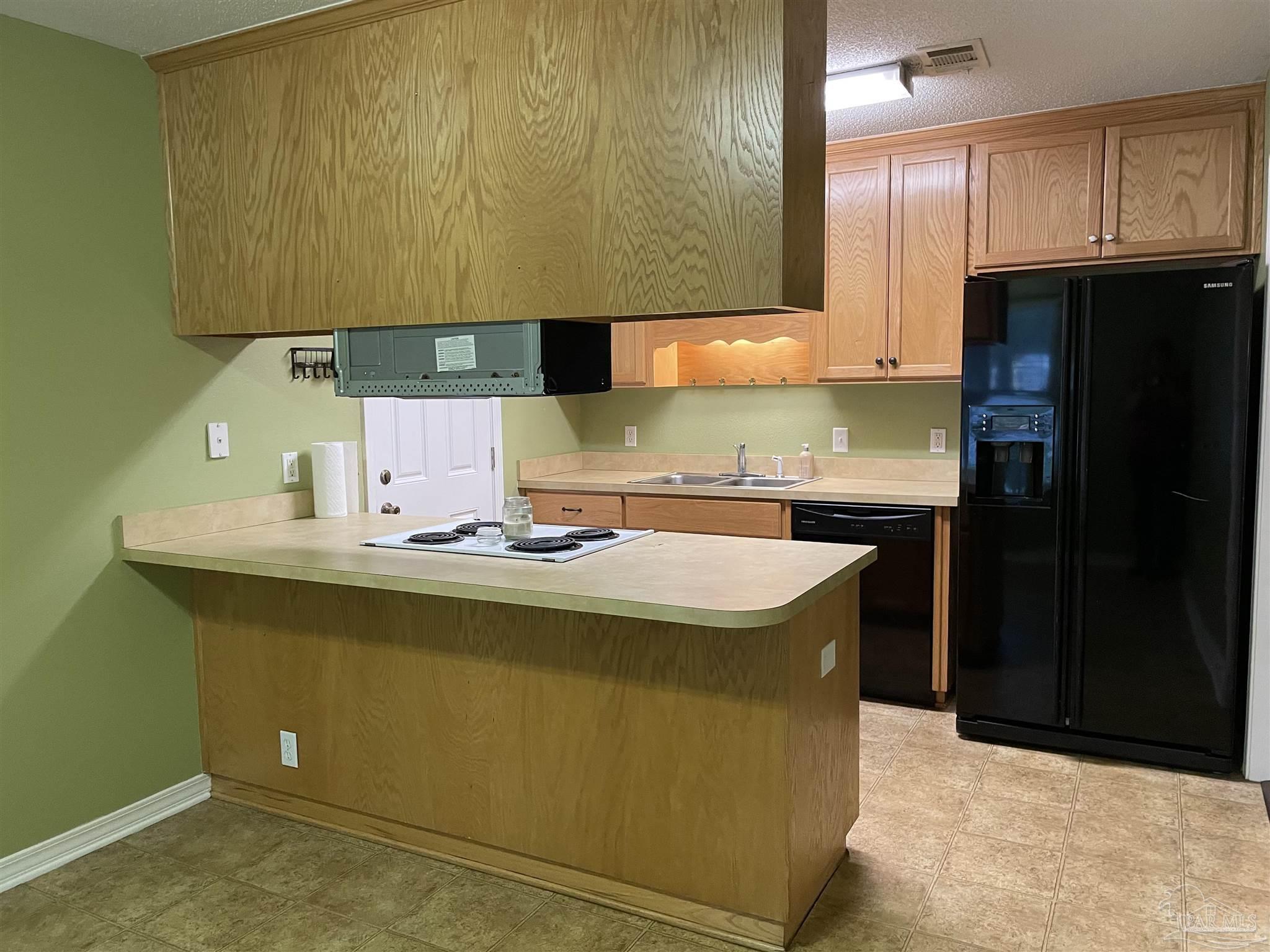 6465 Da Lisa Road Milton, FL 32583 - Photo 2 of 20 KITCHEN WITH BAR