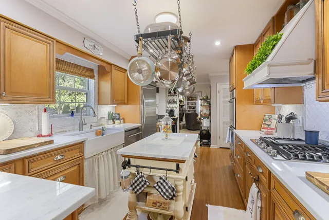 a kitchen with a table and chairs in it