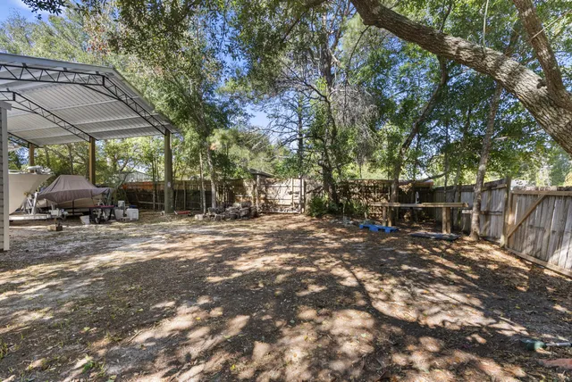a view of backyard with green space