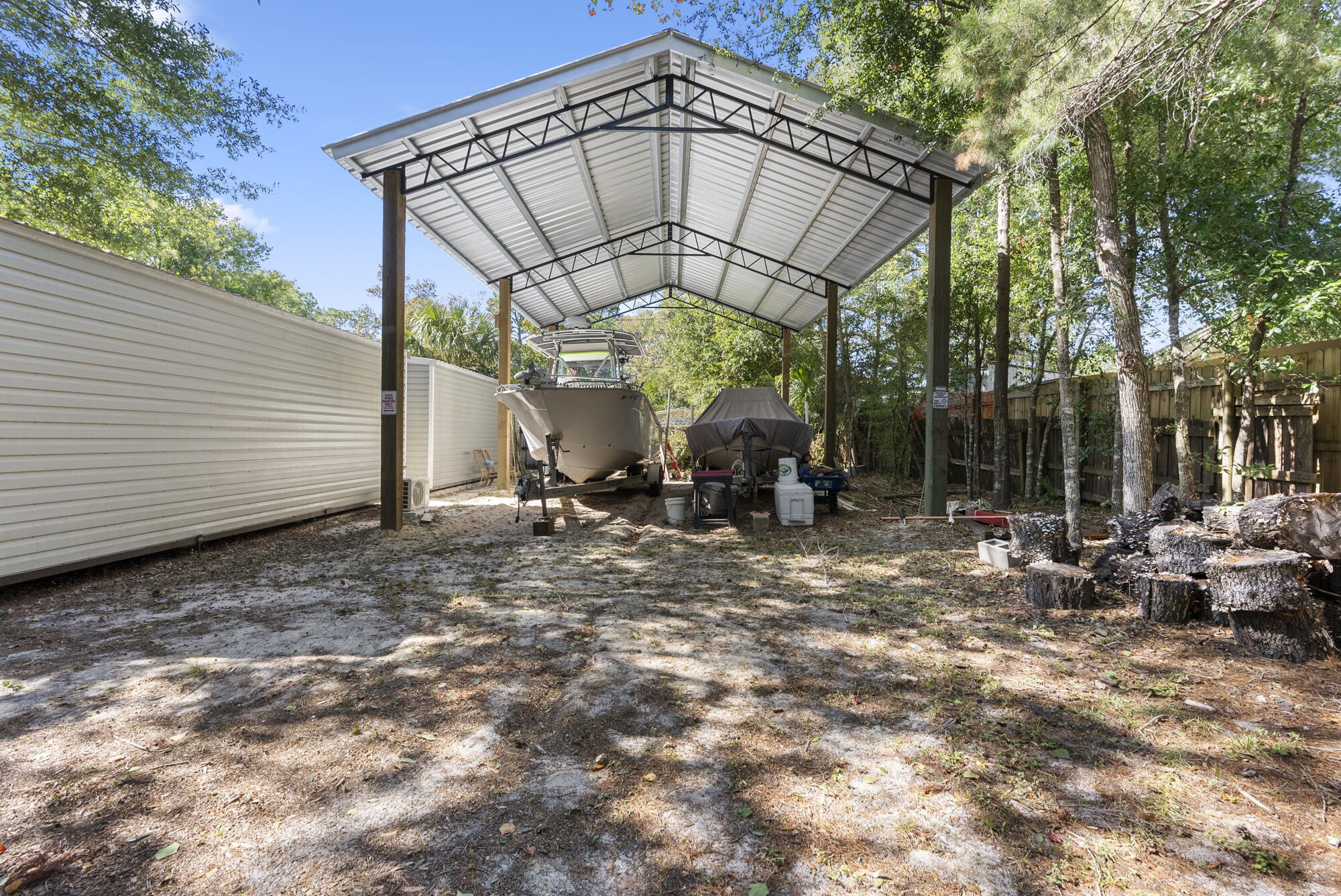 902 Northwest Ave D Carrabelle, FL 32322 - Photo 30 of 32 a view of a house with a outdoor space
