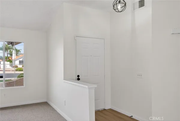 a bathroom with a sink and a window