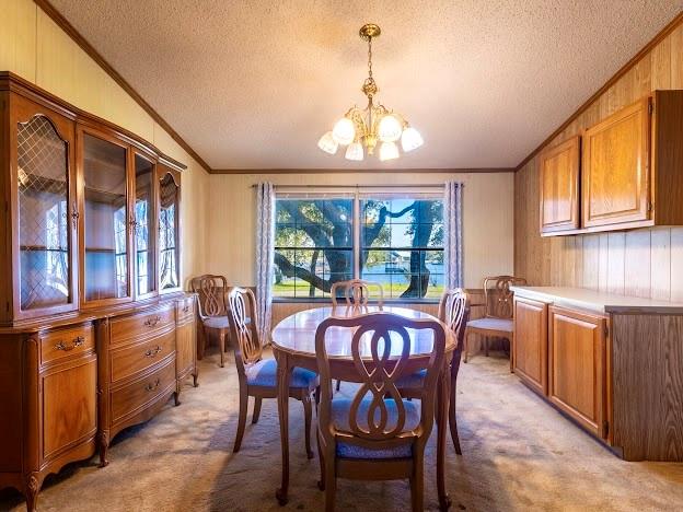 4713 Fox Hollow Road Graham, TX 76450 - Photo 12 of 39 a view of a dining room with furniture large windows and wooden floor