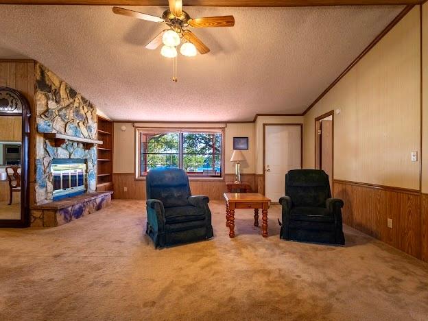 4713 Fox Hollow Road Graham, TX 76450 - Photo 39 of 39 a living room with furniture and a flat screen tv