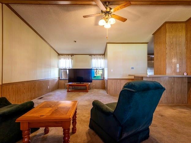 4713 Fox Hollow Road Graham, TX 76450 - Photo 13 of 39 a living room with furniture and a flat screen tv