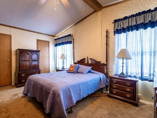 4713 Fox Hollow Road Graham, TX 76450 - Photo 15 of 39 a bedroom with a bed and a window