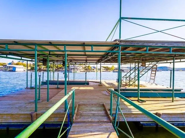 a view of swimming pool with seating area