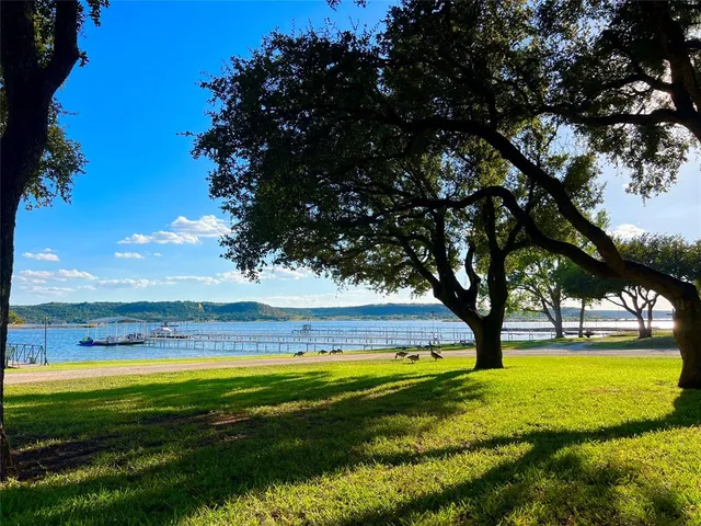 a view of swimming pool with an outdoor space and seating area