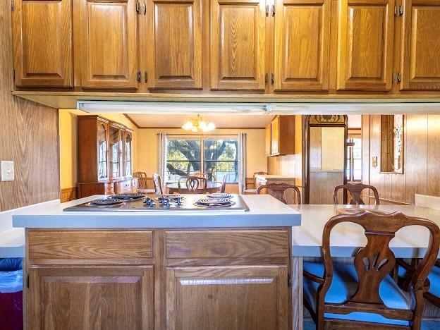 4713 Fox Hollow Road Graham, TX 76450 - Photo 10 of 39 a kitchen with stainless steel appliances granite countertop a refrigerator and a stove