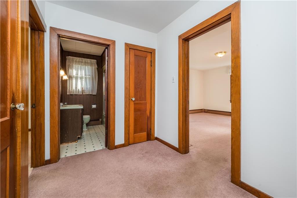 1544 Rte 2023 Monongahela, PA 15063 - Photo 12 of 30 an empty room and a bathroom with mirror