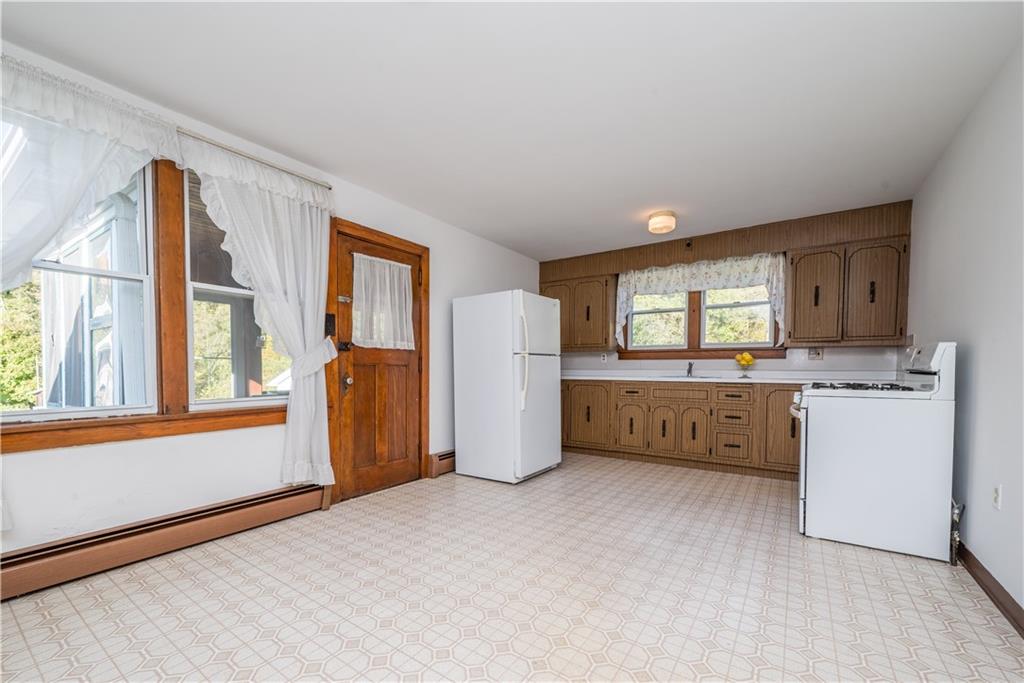 1544 Rte 2023 Monongahela, PA 15063 - Photo 8 of 30 a view of a kitchen with refrigerator and window