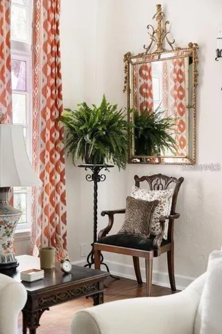 a kitchen with stainless steel appliances a white stove top oven and cabinets