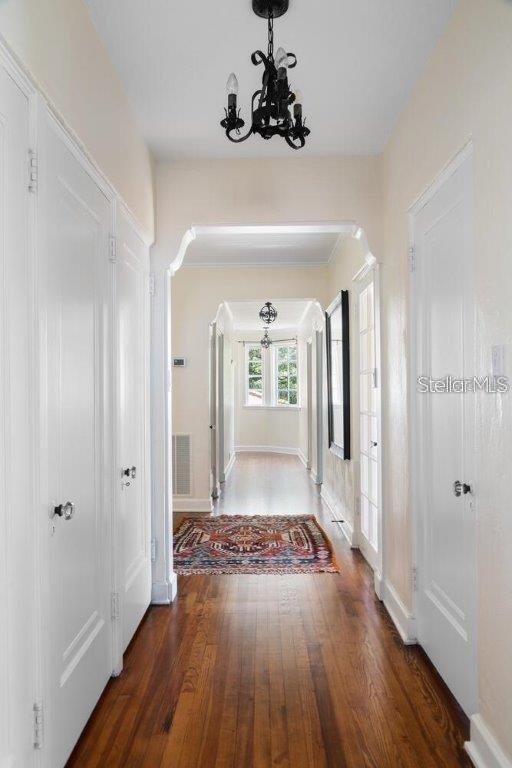 4511 Bay Shore Road Sarasota, FL 34234 - Photo 36 of 69 a view of an entryway with wooden floor and a door