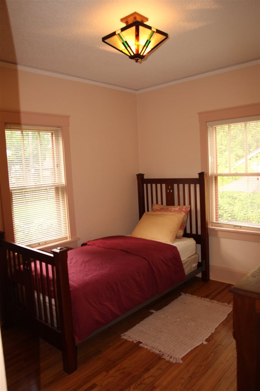 429 Dawson Avenue Rockford, IL 61107 - Photo 11 of 25 a bedroom with a bed and window