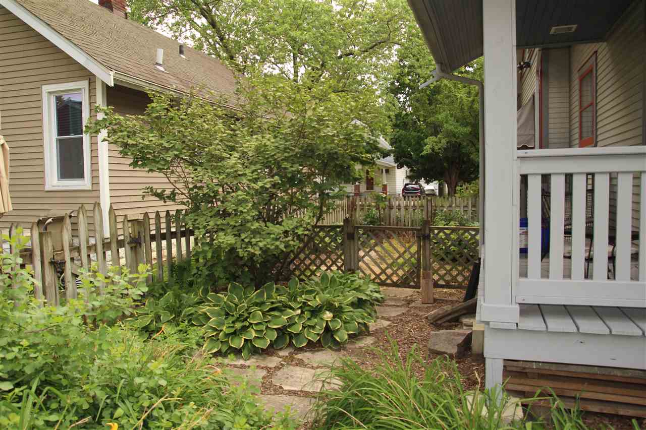 429 Dawson Avenue Rockford, IL 61107 - Photo 19 of 25 a view of a house with a yard
