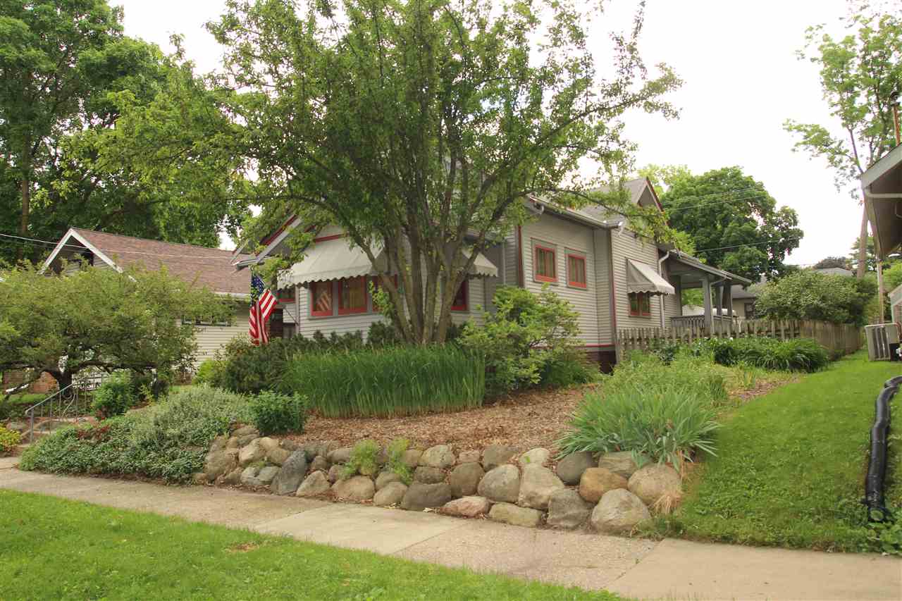 429 Dawson Avenue Rockford, IL 61107 - Photo 2 of 25 a front view of a house with garden