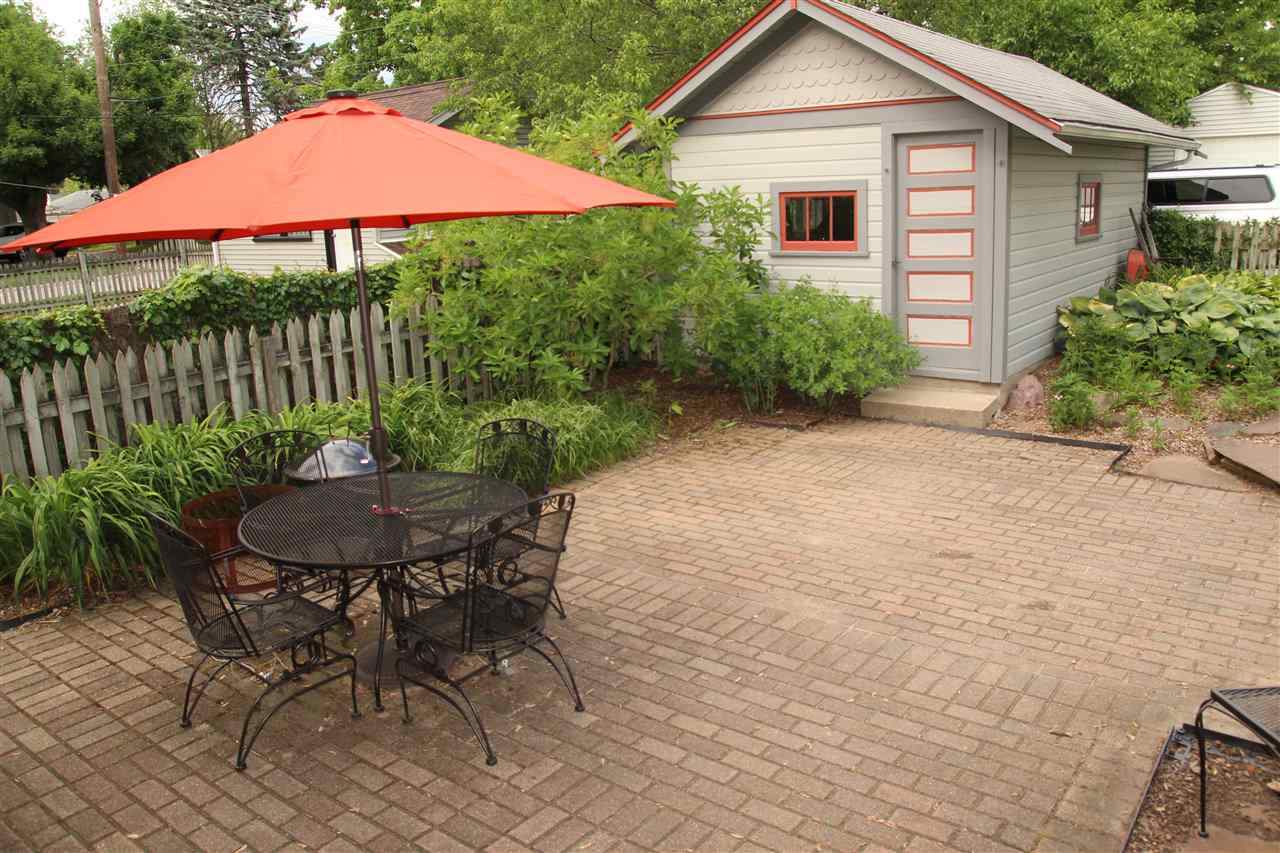 429 Dawson Avenue Rockford, IL 61107 - Photo 21 of 25 a view of a chair and table in the backyard