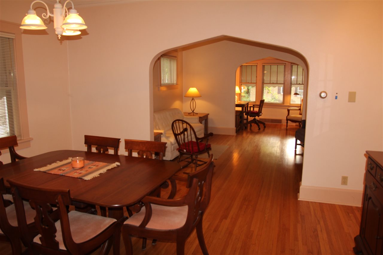 429 Dawson Avenue Rockford, IL 61107 - Photo 7 of 25 a view of a dining room with furniture and chandelier