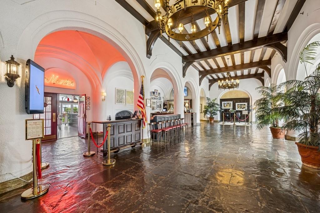 236 Edgemere Street, Unit 427 Montauk, NY 11954 - Photo 15 of 42 Building lobby with high vaulted ceiling and beam ceiling