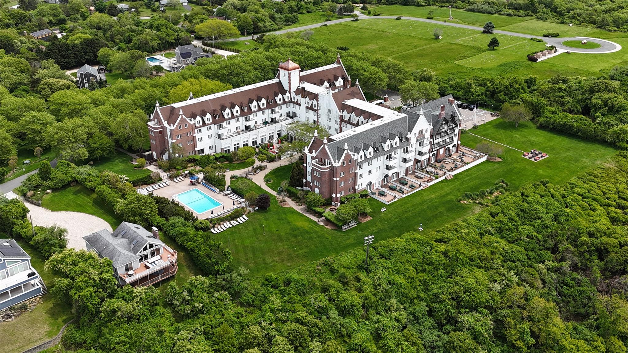 236 Edgemere Street, Unit 427 Montauk, NY 11954 - Photo 33 of 42 Bird's eye view of a pool