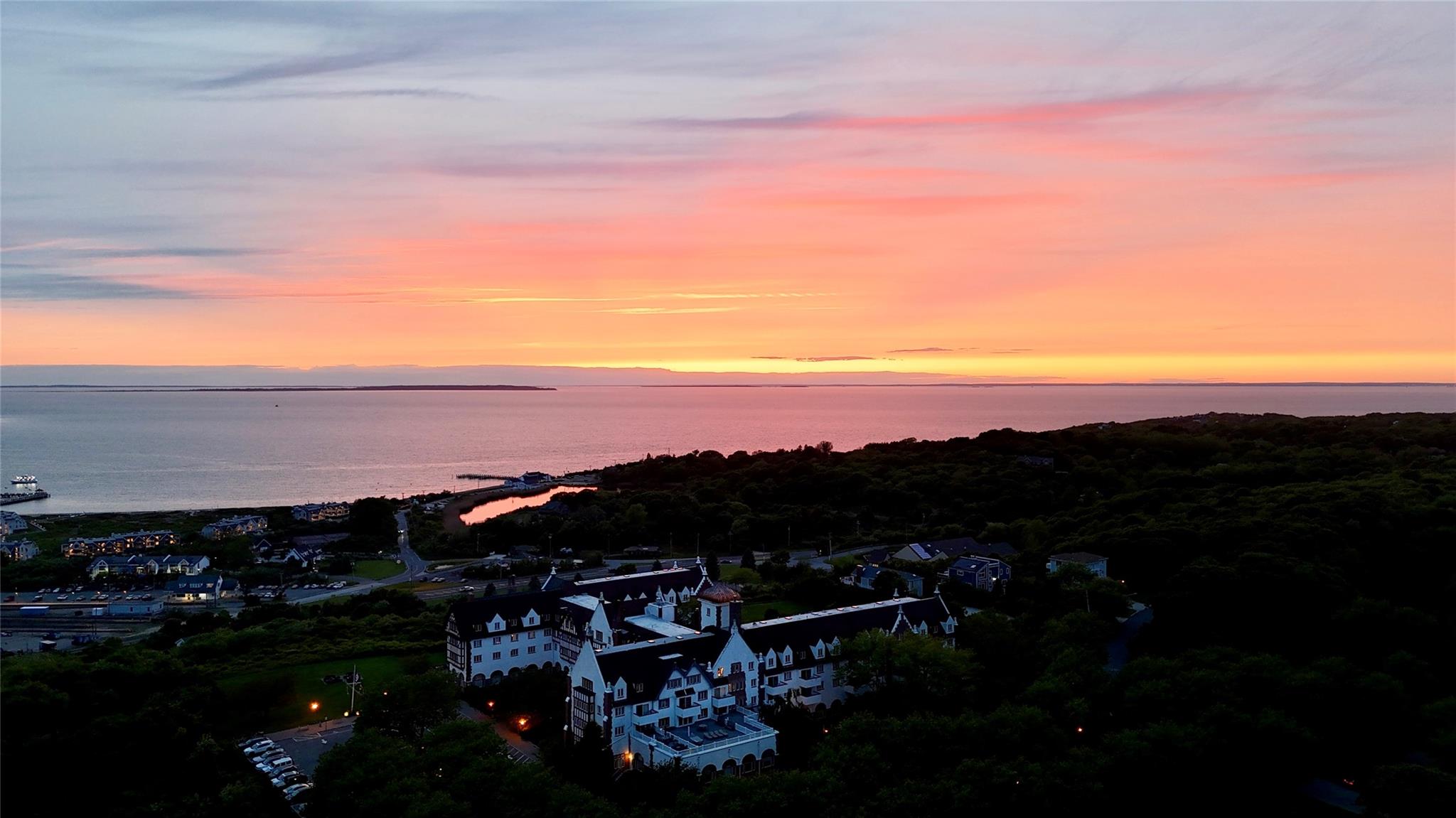 236 Edgemere Street, Unit 427 Montauk, NY 11954 - Photo 37 of 42 Aerial view at dusk of a water view