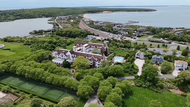 236 Edgemere Street, Unit 427 Montauk, NY 11954 - Photo 39 of 42 Drone / aerial view of a nearby body of water