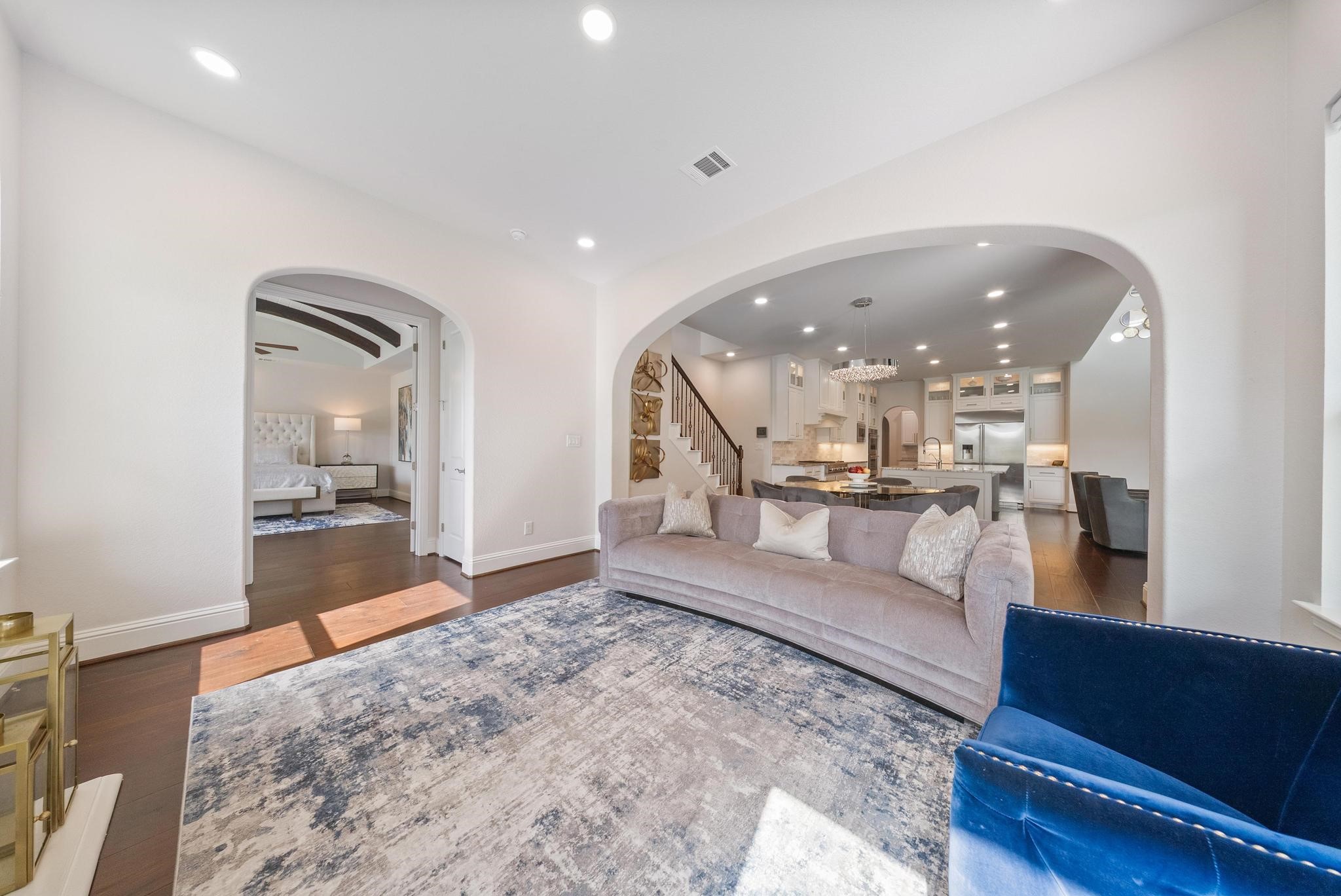 5403 Rouchel Brook Lane Sugar Land, TX 77479 - Photo 42 of 42 Hearth room just off the breakfast area, offering serene outdoor views and a versatile space to unwind or entertain. Thoughtfully designed for effortless gatherings with family and friends in your open floorplan.