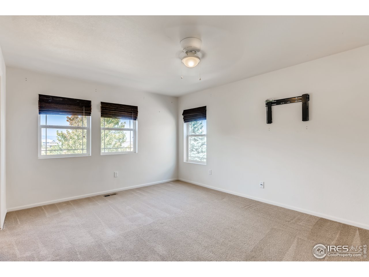 2175 Coach House Loop Castle Rock, CO 80109 - Photo 11 of 33 an empty room with windows