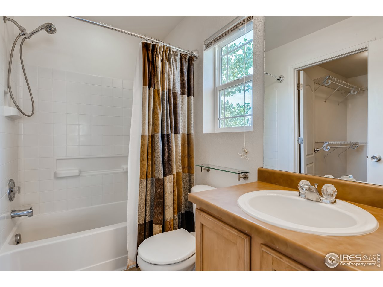2175 Coach House Loop Castle Rock, CO 80109 - Photo 15 of 33 a bathroom with a sink toilet and shower