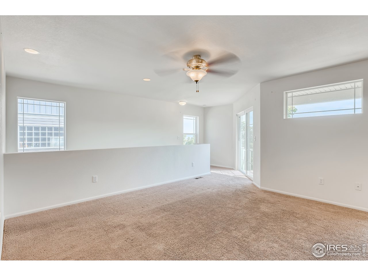 2175 Coach House Loop Castle Rock, CO 80109 - Photo 20 of 33 a view of an empty room with a window