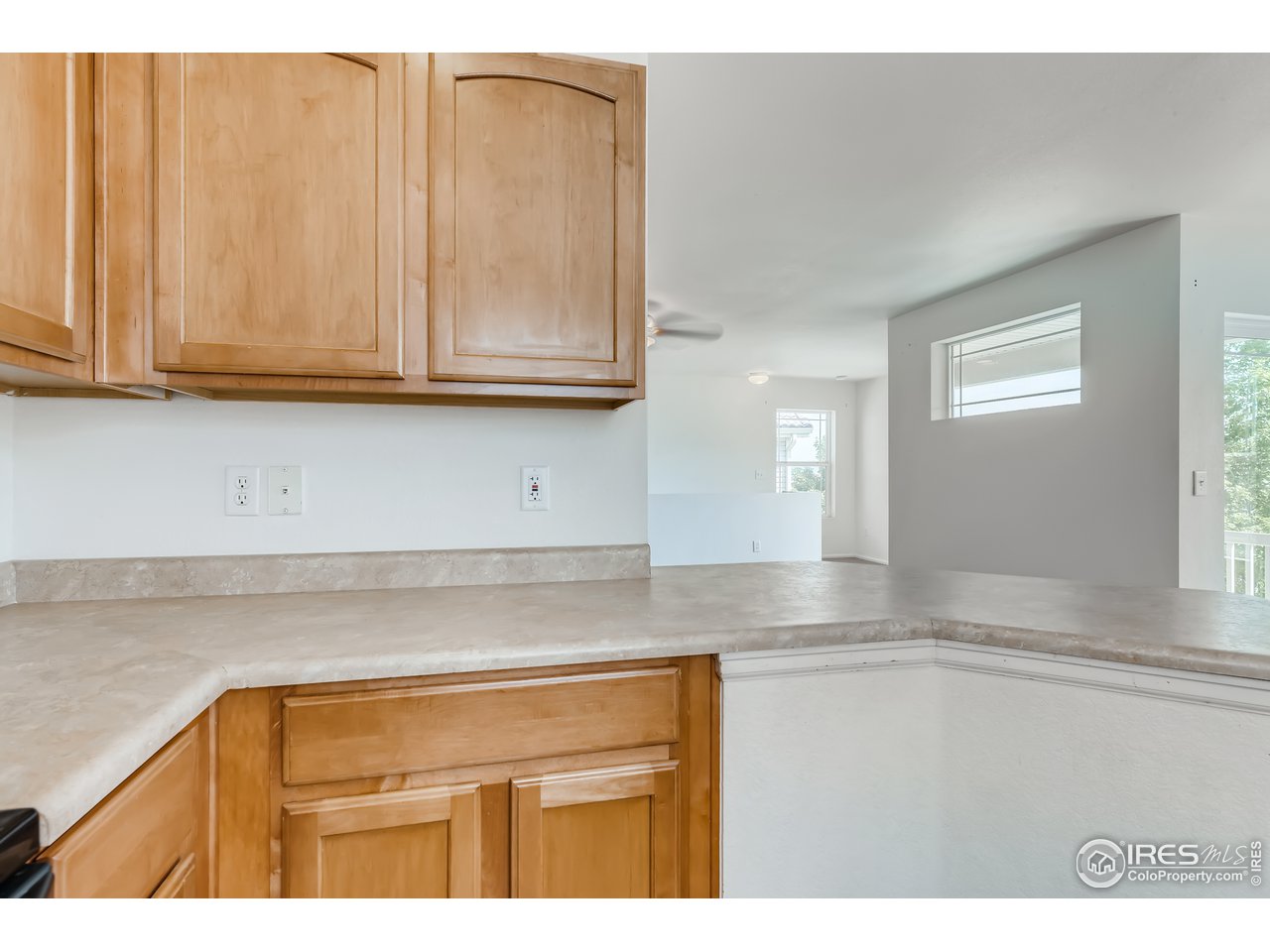 2175 Coach House Loop Castle Rock, CO 80109 - Photo 26 of 33 a view of kitchen with granite countertop cabinets