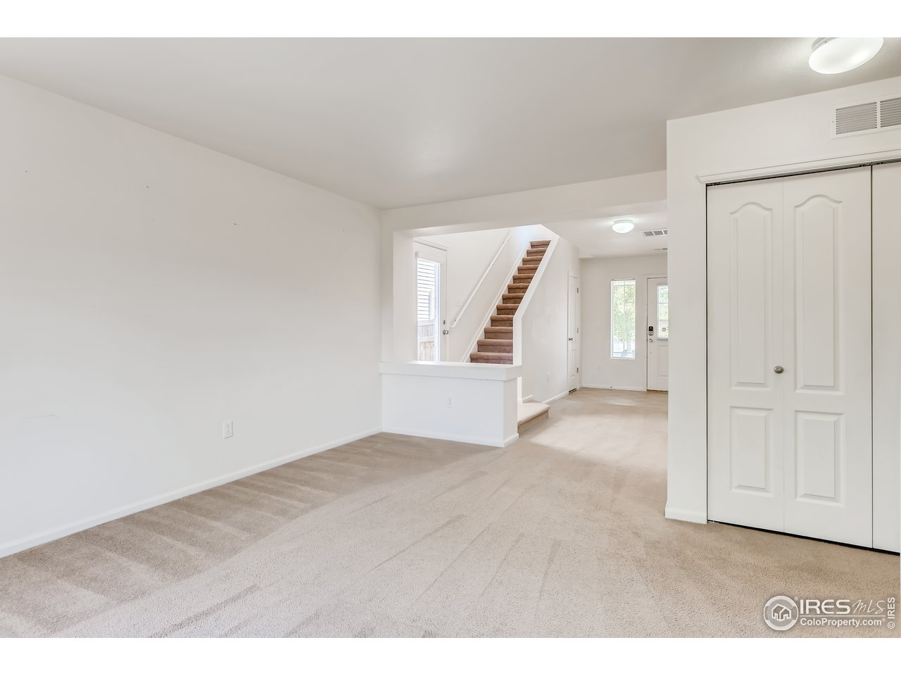 2175 Coach House Loop Castle Rock, CO 80109 - Photo 6 of 33 view of empty room with wooden floor and fan