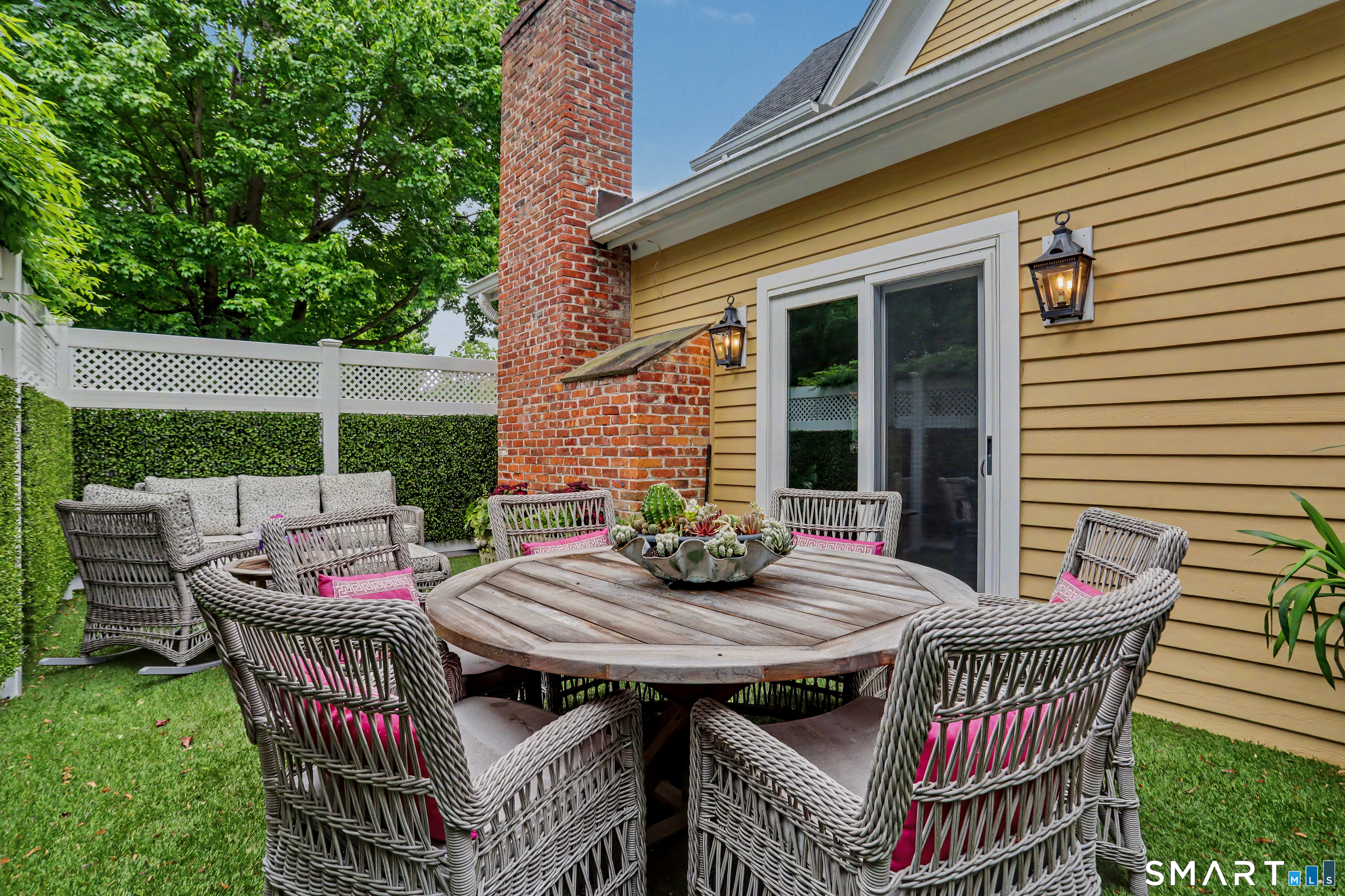 36 Catoonah Street, Unit 18 Ridgefield, CT 06877 - Photo 30 of 40 a view of a deck with furniture