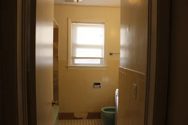 a bathroom with a toilet