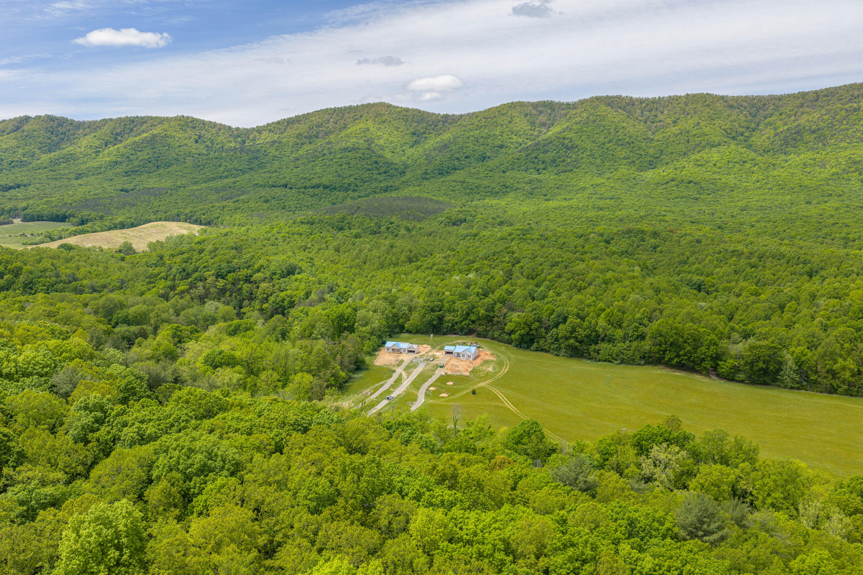 Lot 2 Haymakertown Road Troutville, VA 24175 - Photo 2 of 2 a view of a lush green hillside and a houses