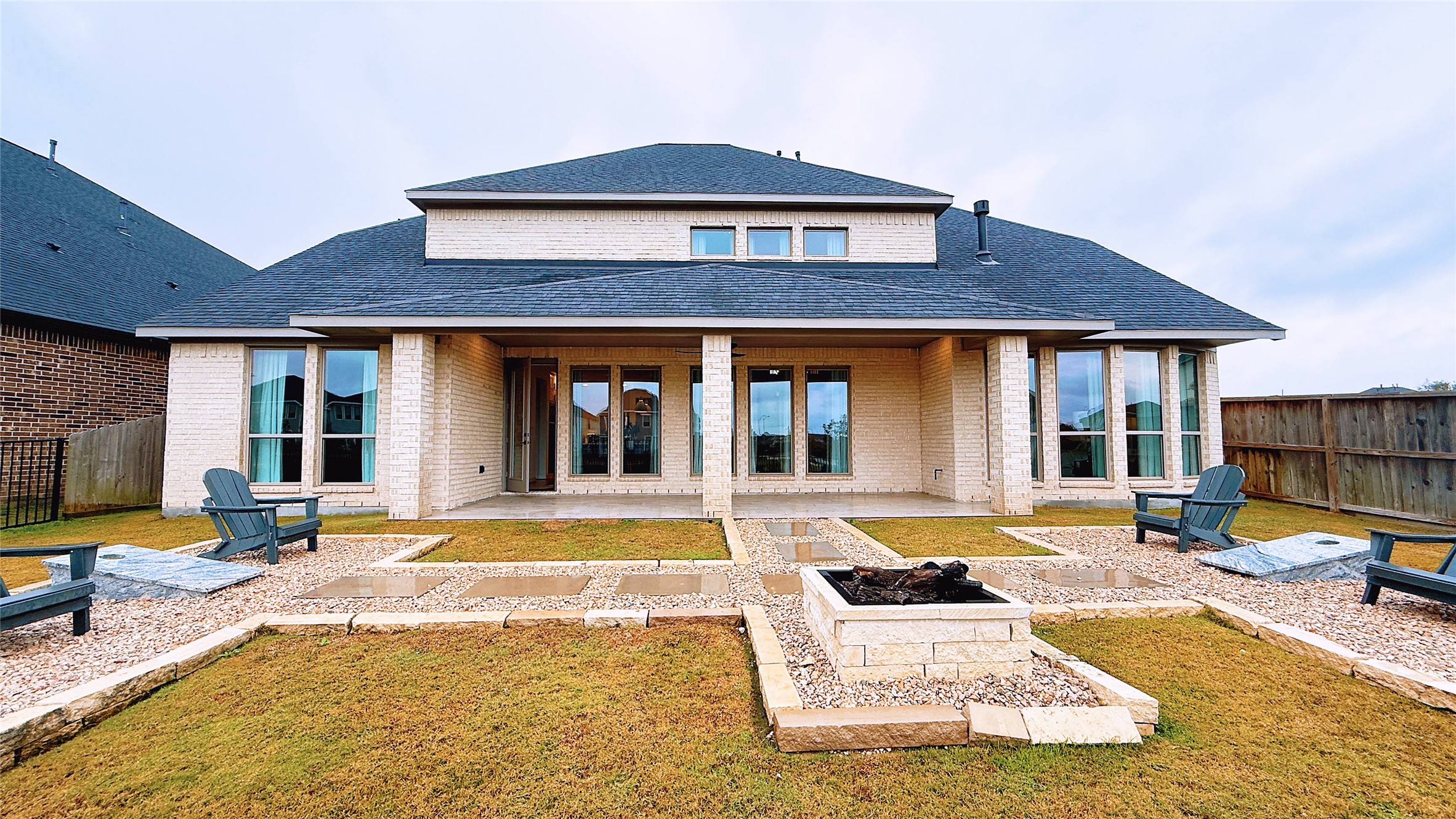 5603 Logan Ridge Lane Fulshear, TX 77441 - Photo 7 of 43 a view of a house with swimming pool and sitting area