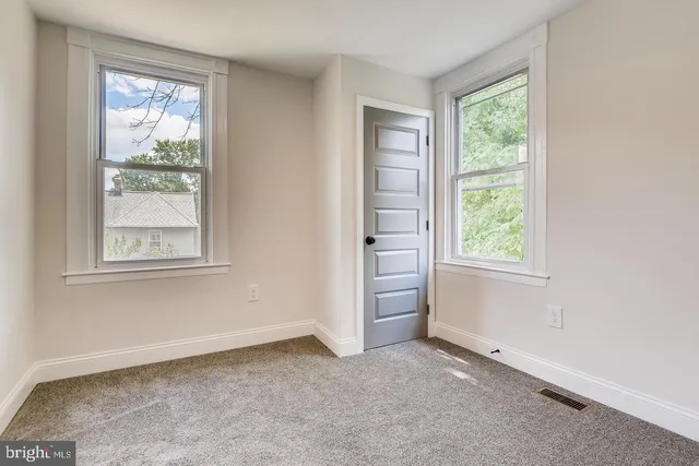 an empty room with an entryway