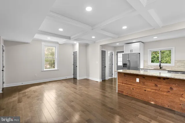 a view of kitchen and windows