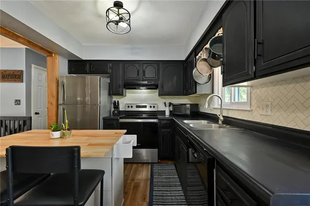 $287,900 | 512 South Washington Street, Raymore, MO 64083