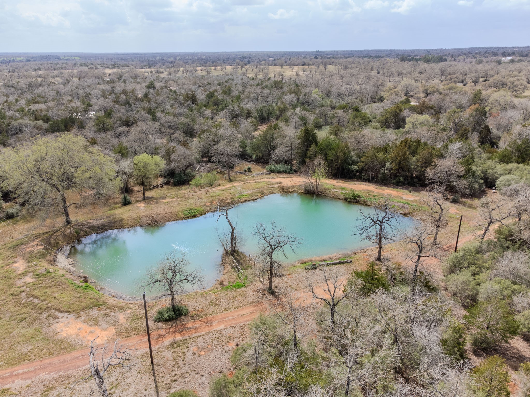 7519 Silvermine Road Harwood, TX 78632 - Photo 2 of 20 an aerial view of a house with a yard