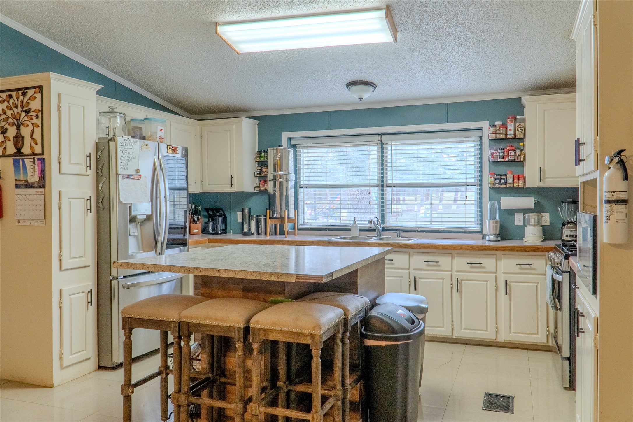 7519 Silvermine Road Harwood, TX 78632 - Photo 9 of 20 a dining table chair next to a window