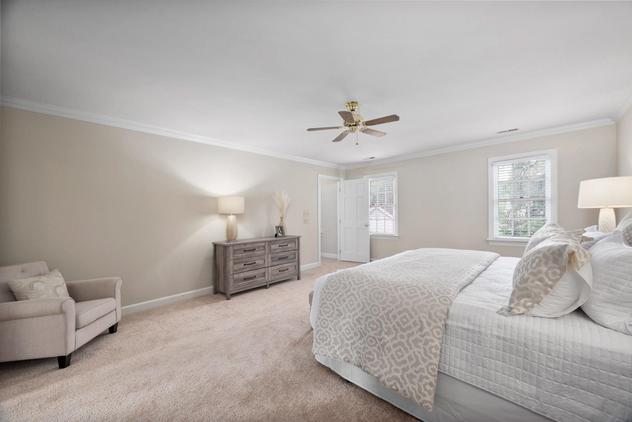2965 Tillinghast Trail Raleigh, NC 27613 - Photo 21 of 48 a spacious bedroom with a bed and furniture