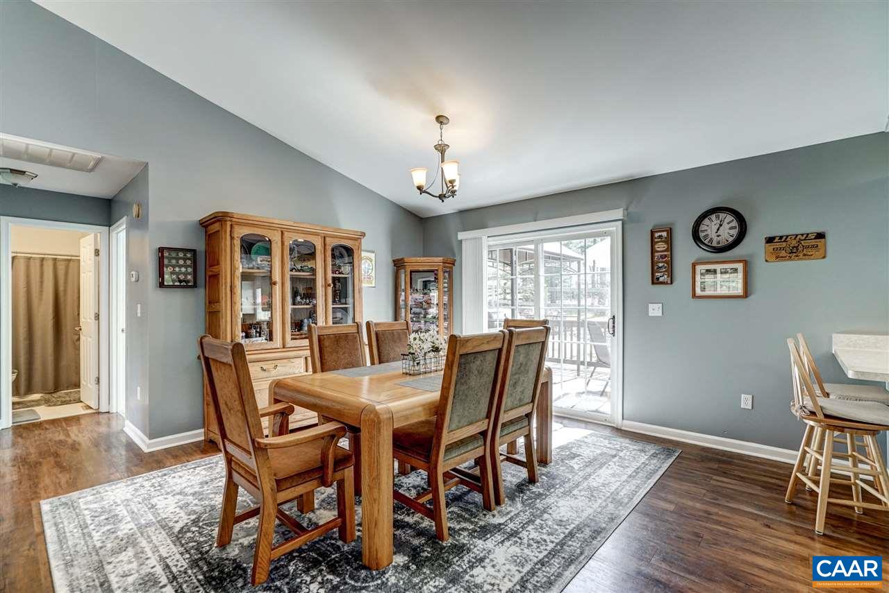7 Haversack Road Palmyra, VA 22963 - Photo 20 of 32 a view of a dining room with furniture window and wooden floor